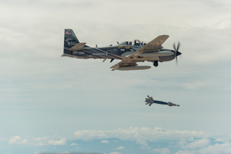 Embrauer Super Tucano aircraft dropping a laser-guided bomb as part of the light attack aircraft competition, 2017.